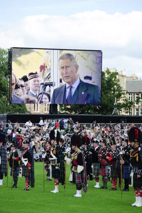 Scotland, City of Edinburgh, Edinburgh. The Prince of Wales on a large screen opening The Gathering 2009 in Holyrood Park. The two day event featured the largest Highland Games to be held in Scotland.