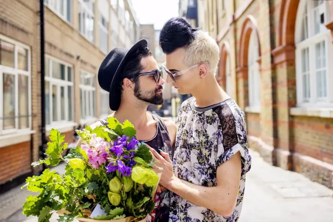 A gay couple enjoy a day out in London.