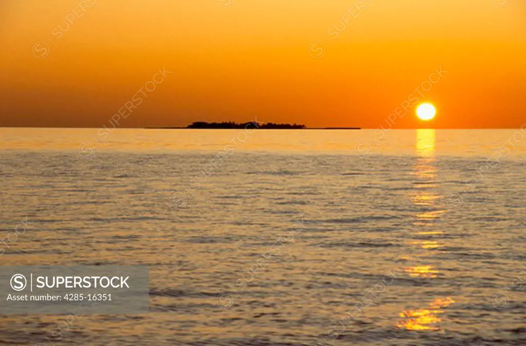 Maldive Islands at sunset in the Indian Ocean