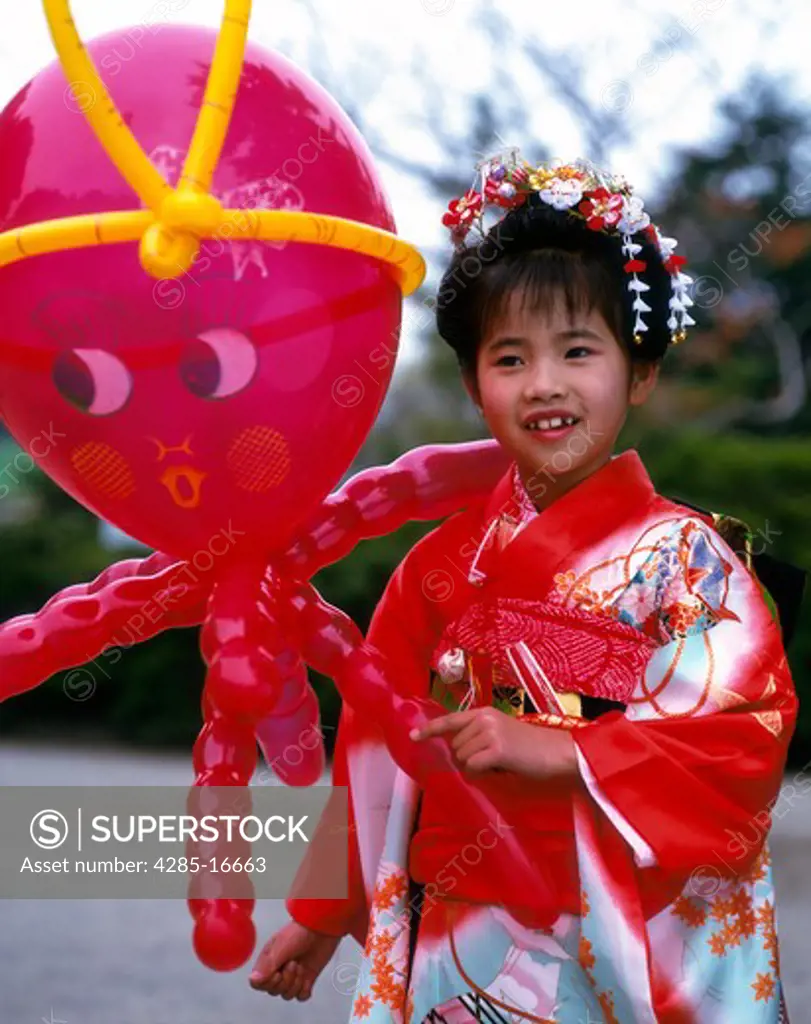 Balloons and Child in Kimono for Shichigosan Festival for 3,5,7 Year Old girls in Japan