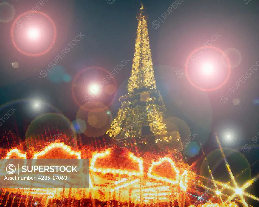 Eiffel Tower and Carousel (Merry-go-round) at night, Paris, France
