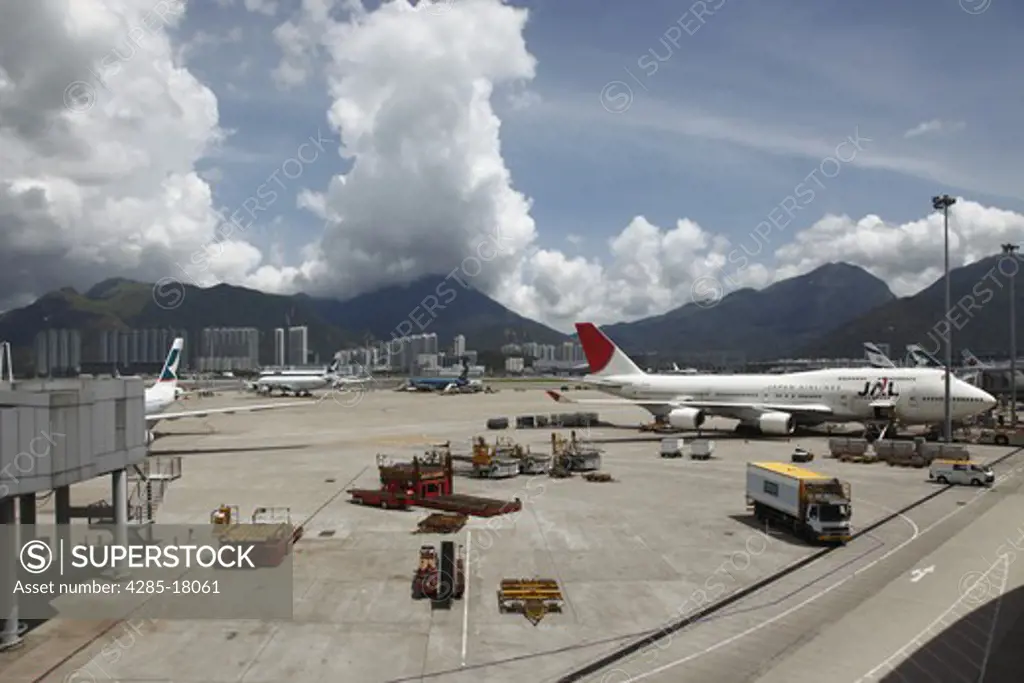 China, Hong Kong International Airport at Chek Lap Kok, Japan Airlines Boeing 747 Docked at Terminal