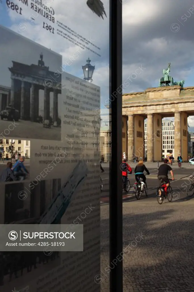 Germany, Berlin, Brandenburg Gate, Brandenburger Tor, 17th June Strasse, Tourists Riding Bicycles, Reflection