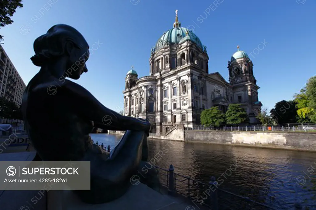 Germany, Berlin, Spree River, Berlin Cathedral, Berliner Dom, Riverbank, Silhouetted Riverside Figure, Female Sculpture