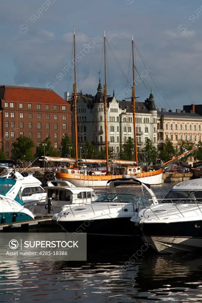 Finland, Helsinki, Helsingfors, North Harbour, Waterfront Buildings, Moored Motorboats at Marina