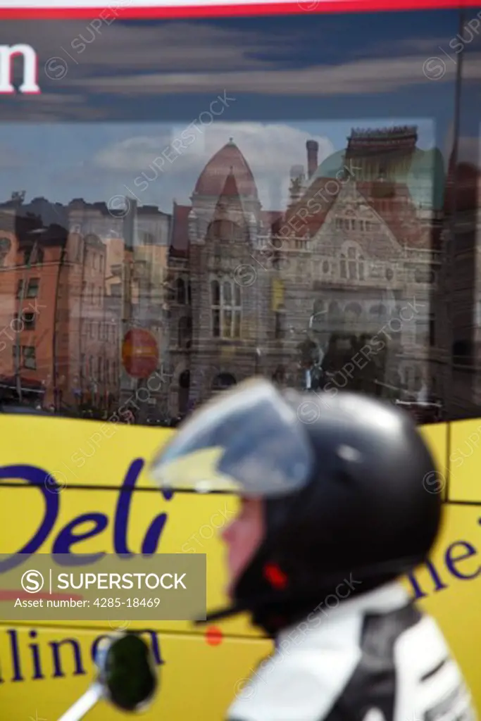 Finland, Helsinki, Helsingfors, Finnish National Theatre Reflected in Bus Window, Motor Cyclist