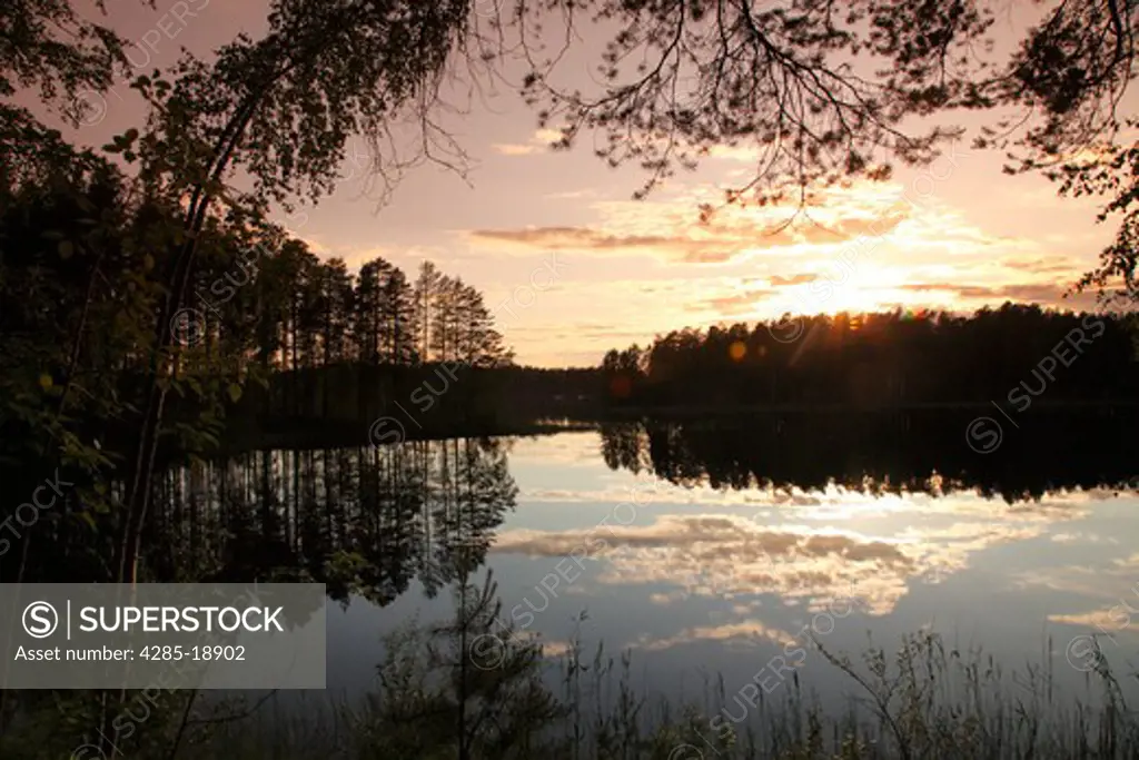 Finland, Region of Southern Savonia, Savonlinna, Punkaharju Ridge, Punkaharju Nature Reserve, Saimaa Lake District, Lake Pihlajavesi at Sunset