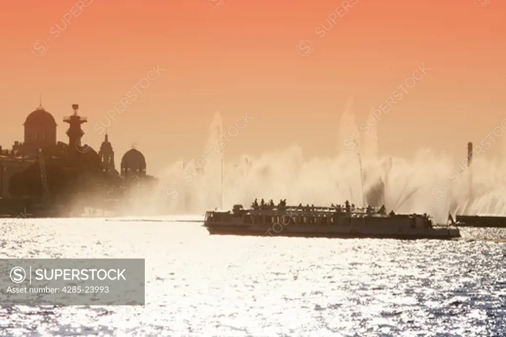 Russia, St Petersburg, Neva River, Tourist Boat, Rostral Columns, Fountain, Sunset
