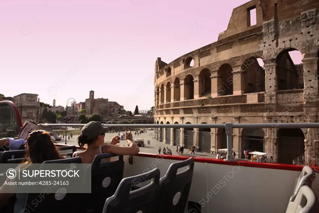 Italy, Lazio, Rome, Colosseum, Tourists in Sightseeing Tour Bus
