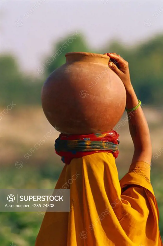 India, Woman Carrying Water