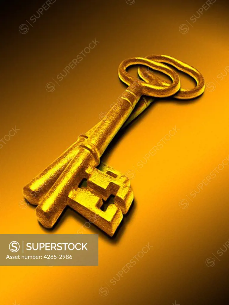 Two antique gold keys shine under the studio lights on an orange background.