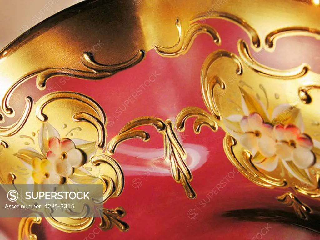 Close-up of Venetian Murano hand blown glass with gold adornments. (2)