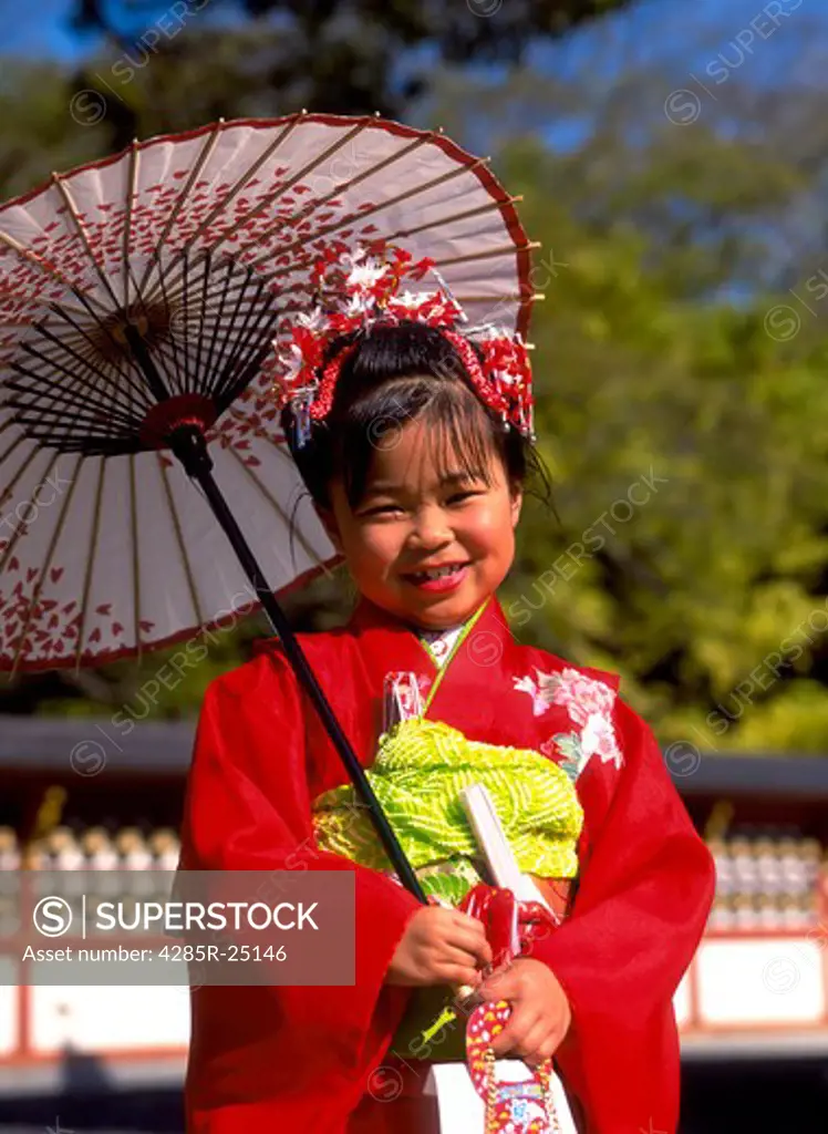 Japan, Tokyo, Young Girl Wearing Kimono