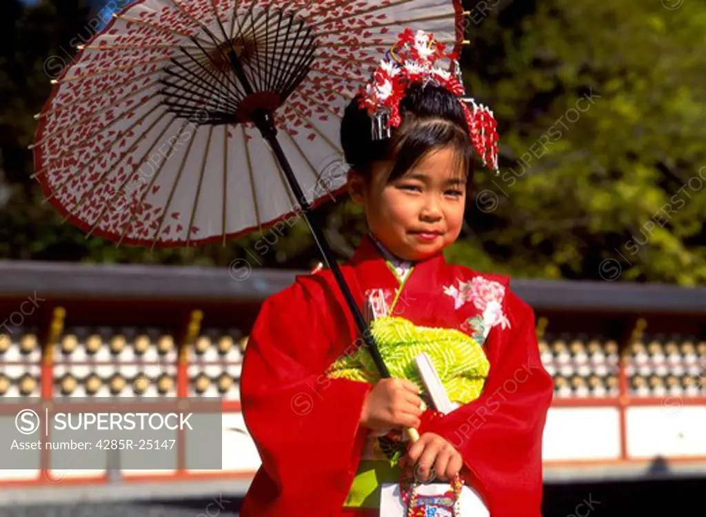 Japan, Tokyo, Young Girl Wearing Kimono