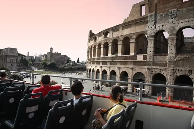 Italy, Lazio, Rome, Colosseum, Tourists in Sightseeing Tour Bus