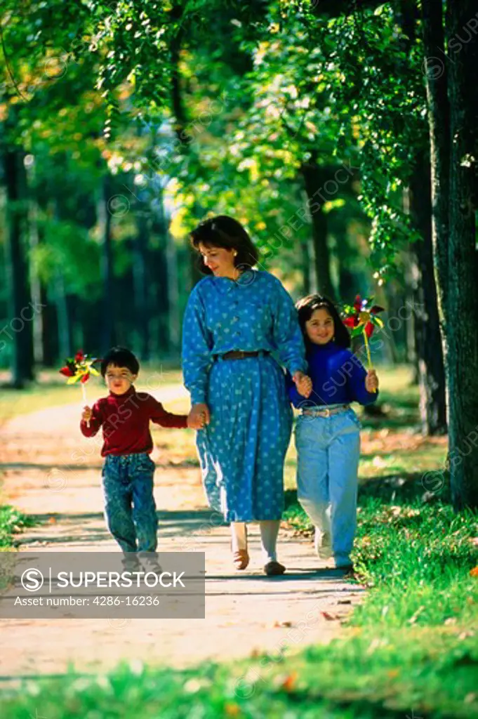 Mother and children walking, MR