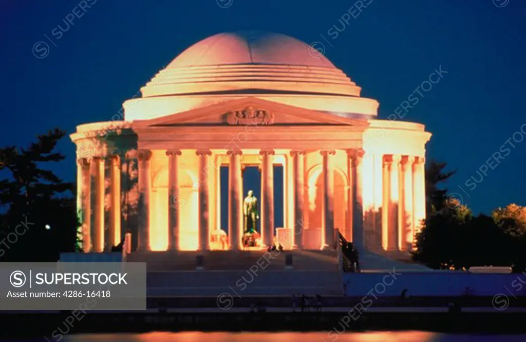 The Jefferson Memorial illuminated at dusk in Washington, D.C.