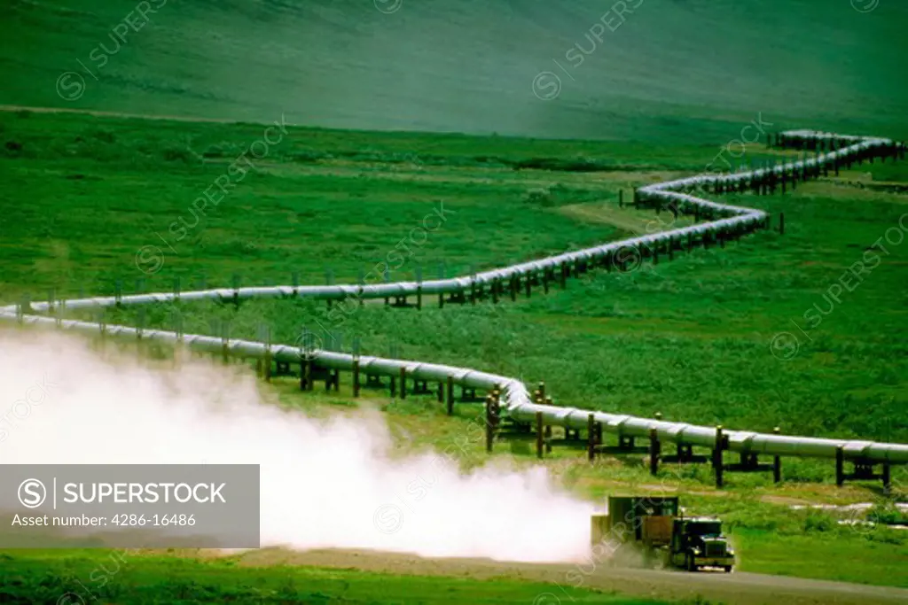 Oil pipeline with truck.