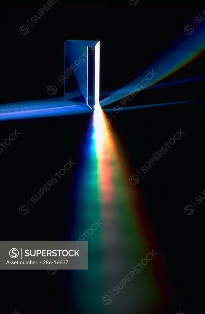 A prism refracting the rainbow spectrum of light.