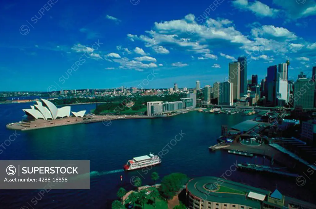 Aerial view looking across Sydney Harbor in Australia. The Sydney Opera House is on the left.