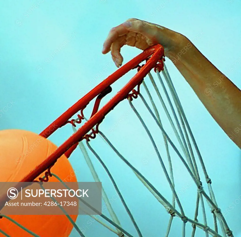 dunking a basketball