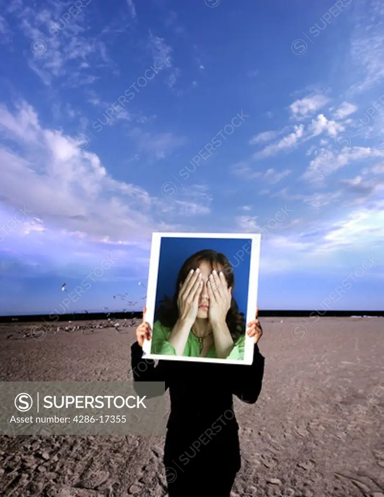 person holding photo