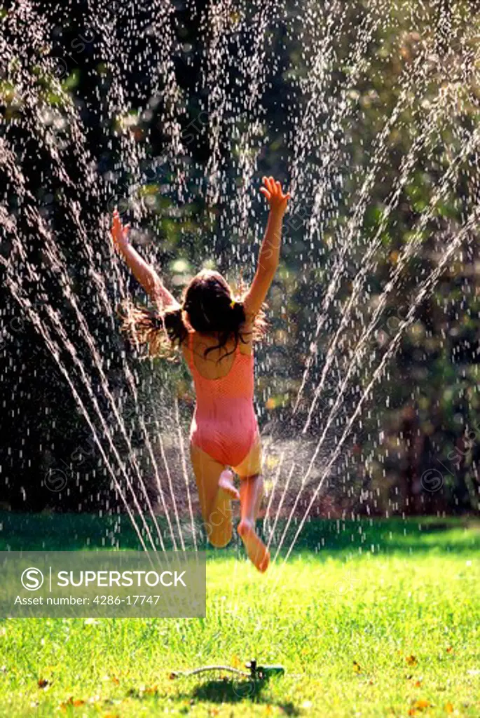 Girl jumps through sprinkler #ABA