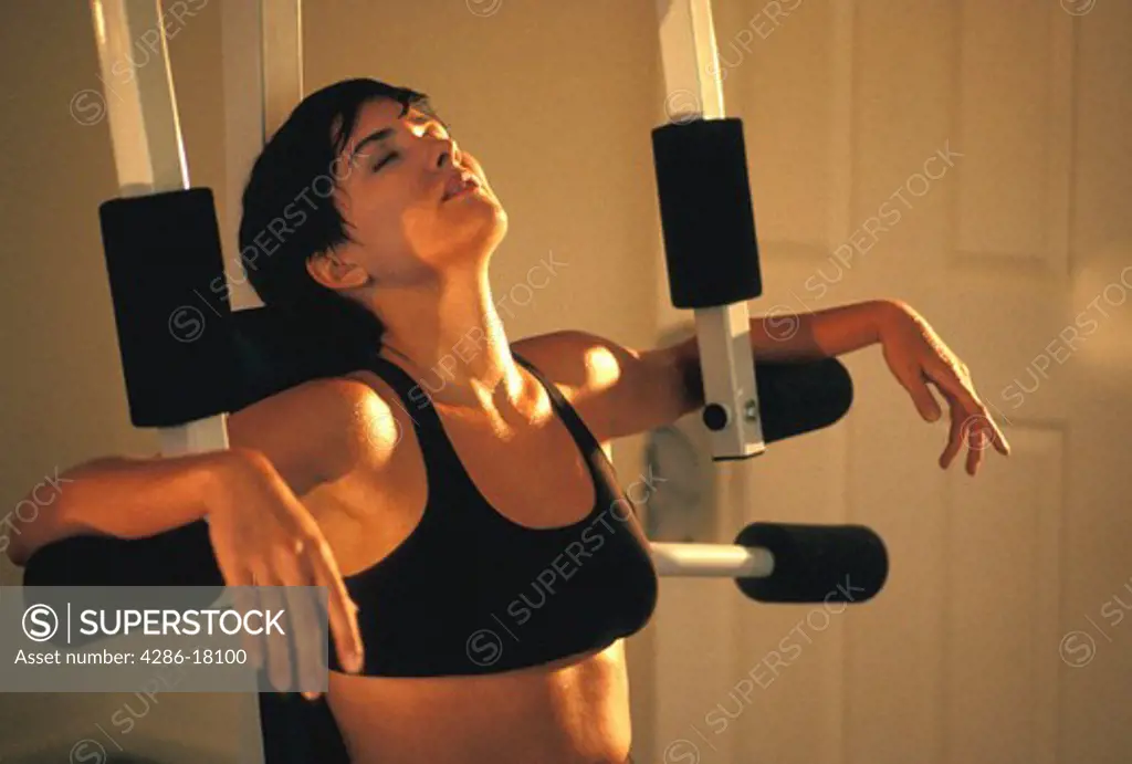 Woman takes a break from exercising.