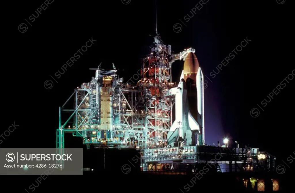 Space Shuttle on  launch pad.
