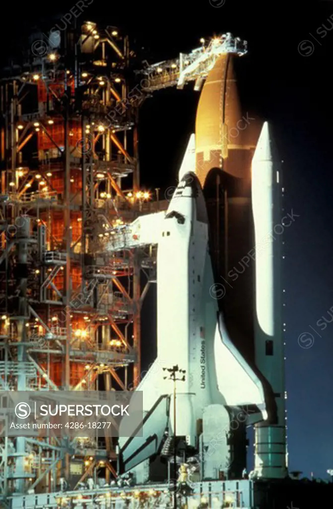Space Shuttle on launch pad.