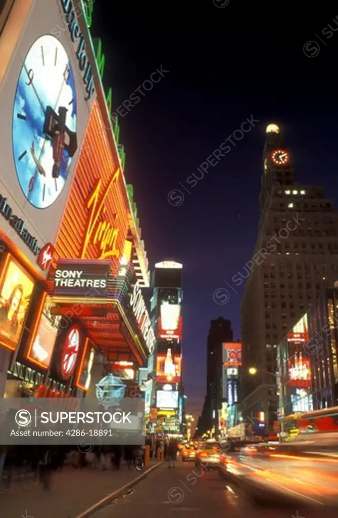 New York City, Manhattan, New York, Time Square illuminated at night (evening) along Broadway in Mid town Manhattan.