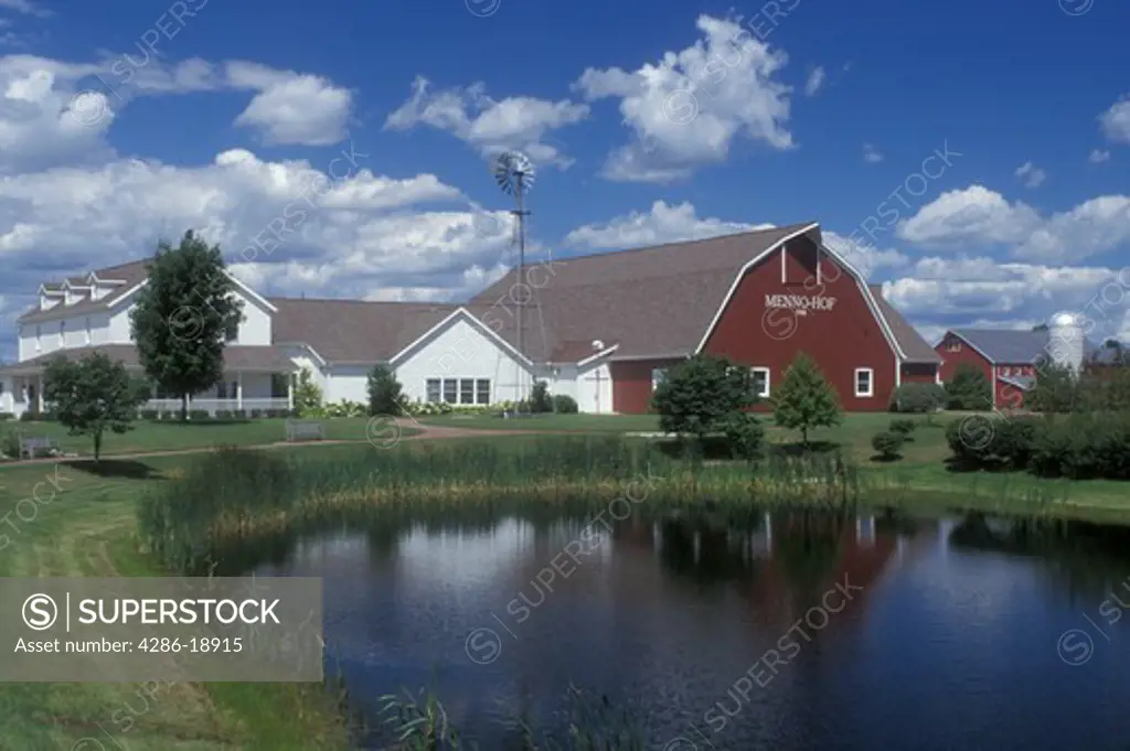 Shipshewana, Indiana, The Menno-Hof Mennonite Visitors Center reflects in the pond in Shipshewana.
