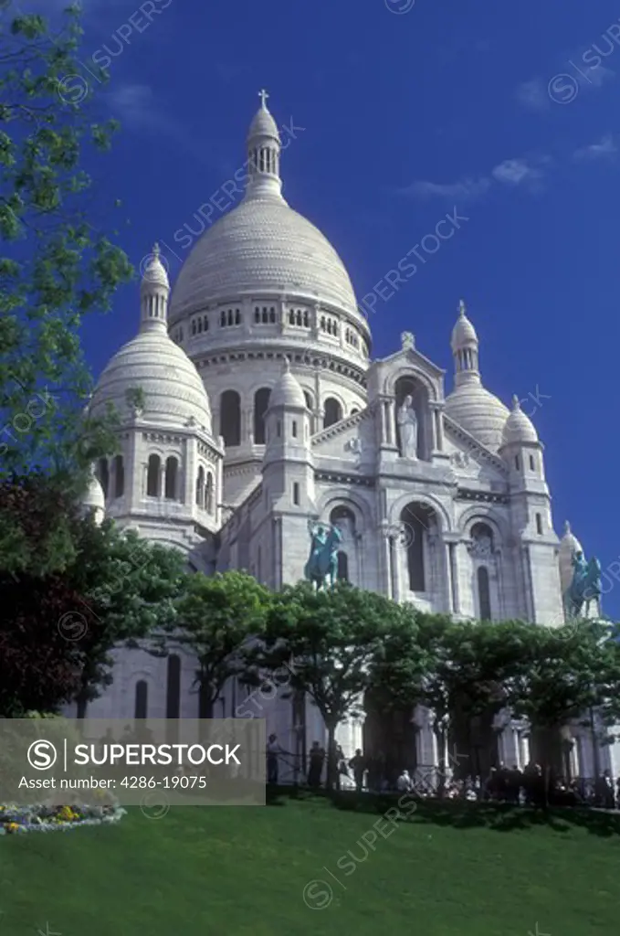 Paris, France, Sacre Coeur, Europe, Montmartre, The elaborate 19th-century Basilique du Sacre Coeur stands majestically on the hill of Montmartre in Paris.
