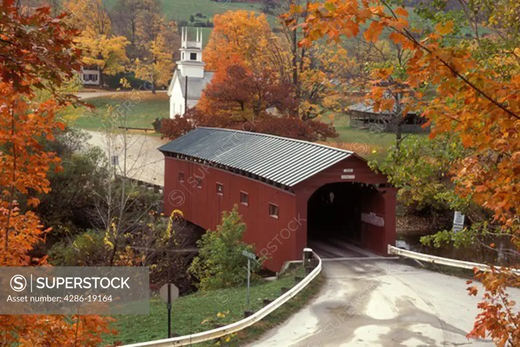 Vermont, covered bridge, A scenic fall setting of a church and Bridge at the Green covered bridge, circa 1852 in West Arlington. 