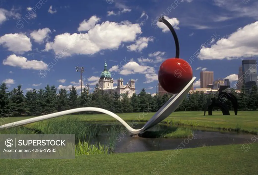Minneapolis, spoon, cherry, Twin Cities, Minnesota, Spoonbridge and Cherry Sculpture in the Minneapolis Sculpture Garden at the Walker Art Center with a view of the skyline of downtown Minneapolis in the state of Minnesota.