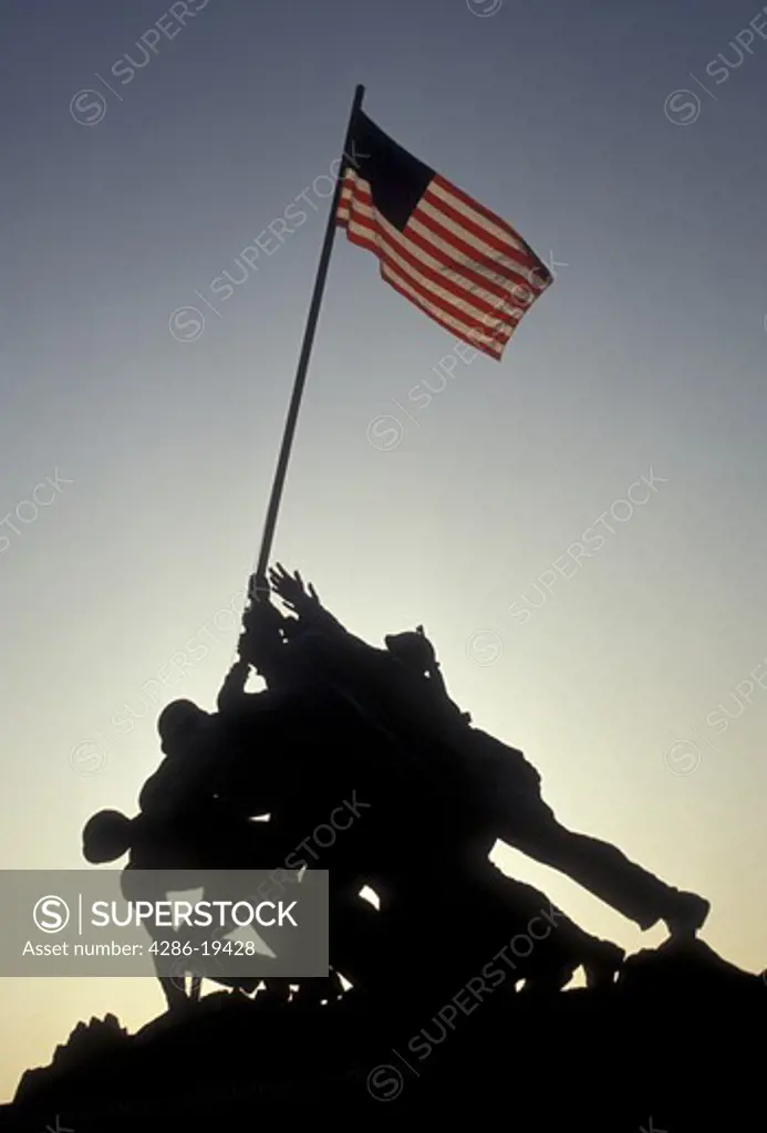 Iwo Jima, Marine Corps War Memorial, silhouette, Arlington National Cemetery, Arlington, Virginia, A silhouette of the raising of the U.S. flag at Iwo Jima, Marine Corps War Memorial at Arlington National Cemetery in Arlington in the state of Virginia.