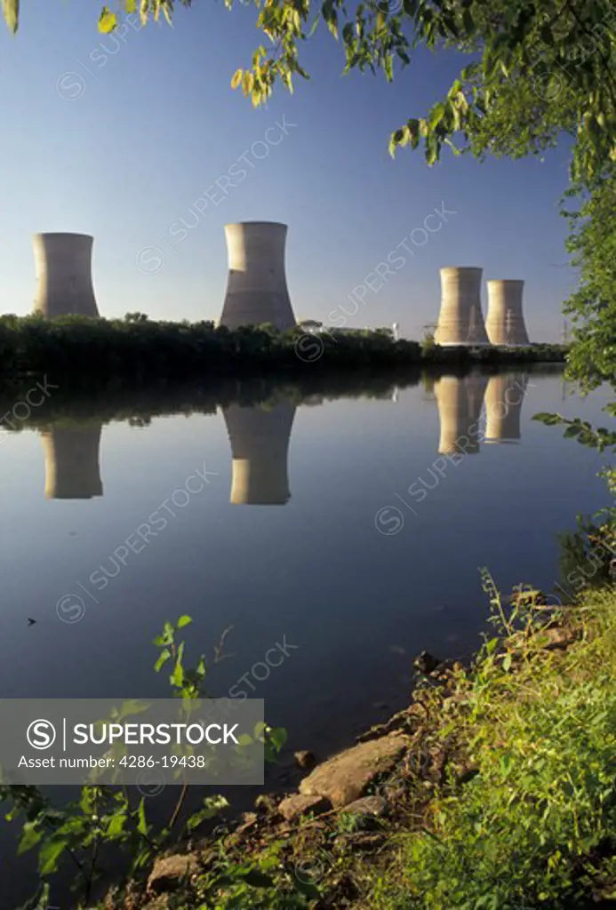 energy, nuclear, Three Mile Island, power, nuclear power plant, Pennsylvania, Three Mile Island Nuclear Power Plant cooling towers reflect in the calm water of the Susquehanna River in Middletown in the state of Pennsylvania. Sight of the 1979 radioactive nuclear accident.