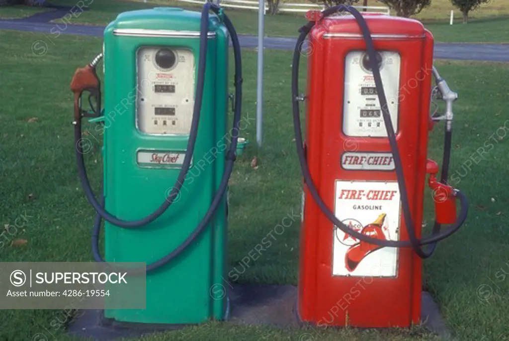 gas pumps, antique, collectibles, A red and green pair of Texaco gas pumps stand outside a garage in Berlin in Washington County in the state of Vermont.