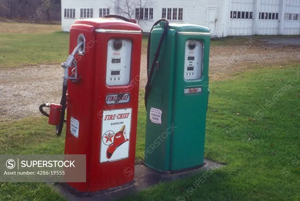 gas pumps, antique, collectibles, A red and green pair of old Texaco gas pumps stand outside a garage in Berlin in Washington County in the state of Vermont.