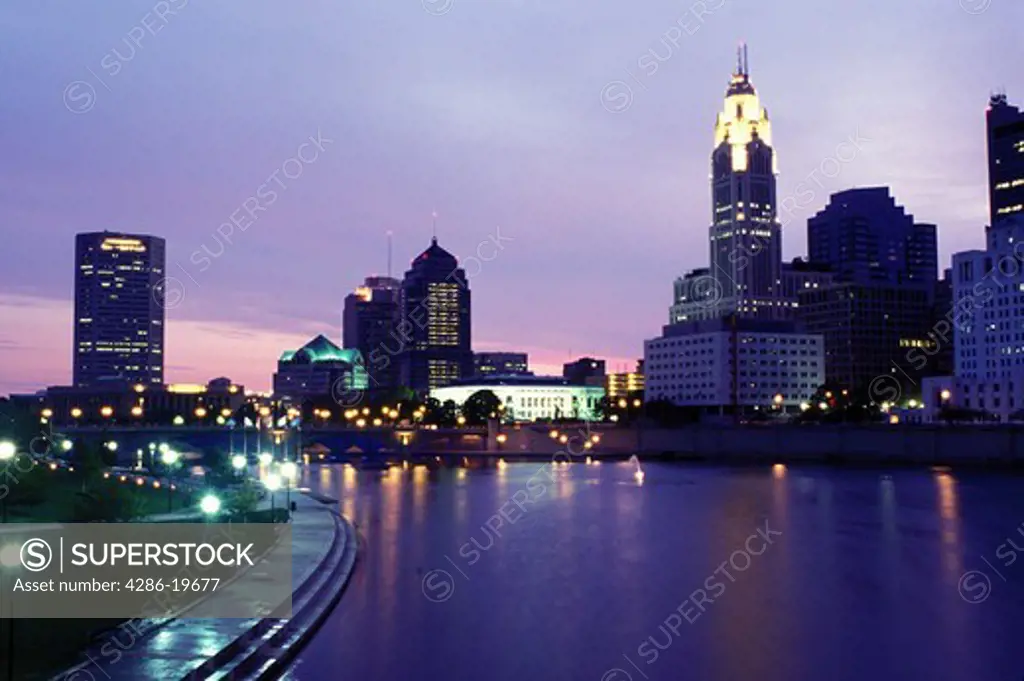 Columbus, skyline, OH, Ohio, Downtown skyline of Columbus along the Scioto River in the evening.