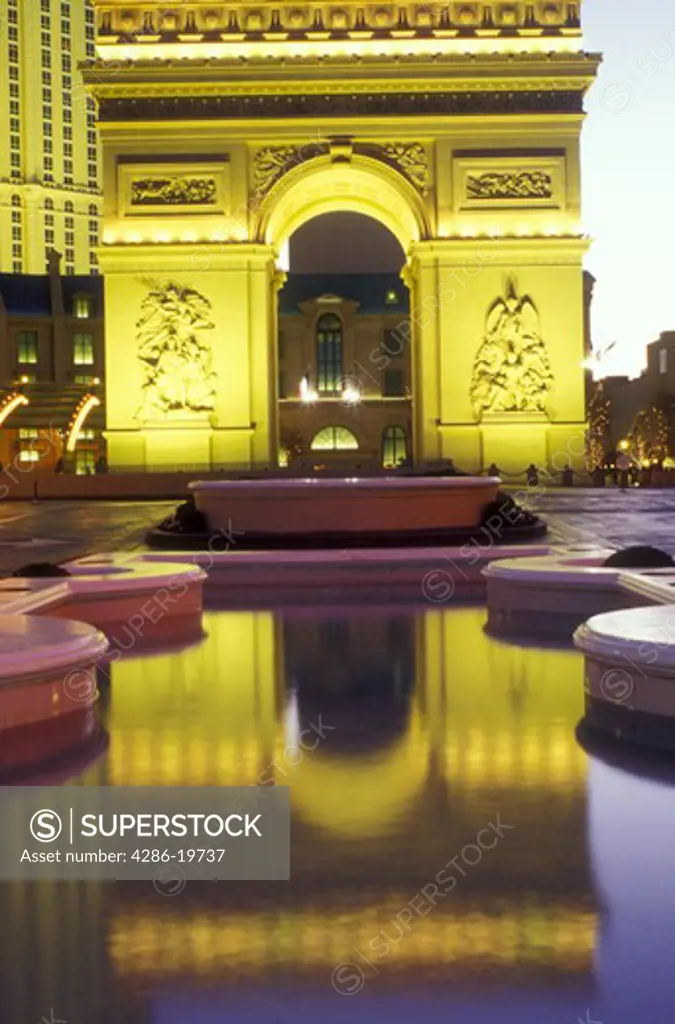 Paris Casino & Resort, Nevada, Las Vegas, NV, Replica of the Arc de Triomphe and other landmarks at Paris Las Vegas Resort & Casino on The Strip at night in Las Vegas, the Entertainment Capital of the World.