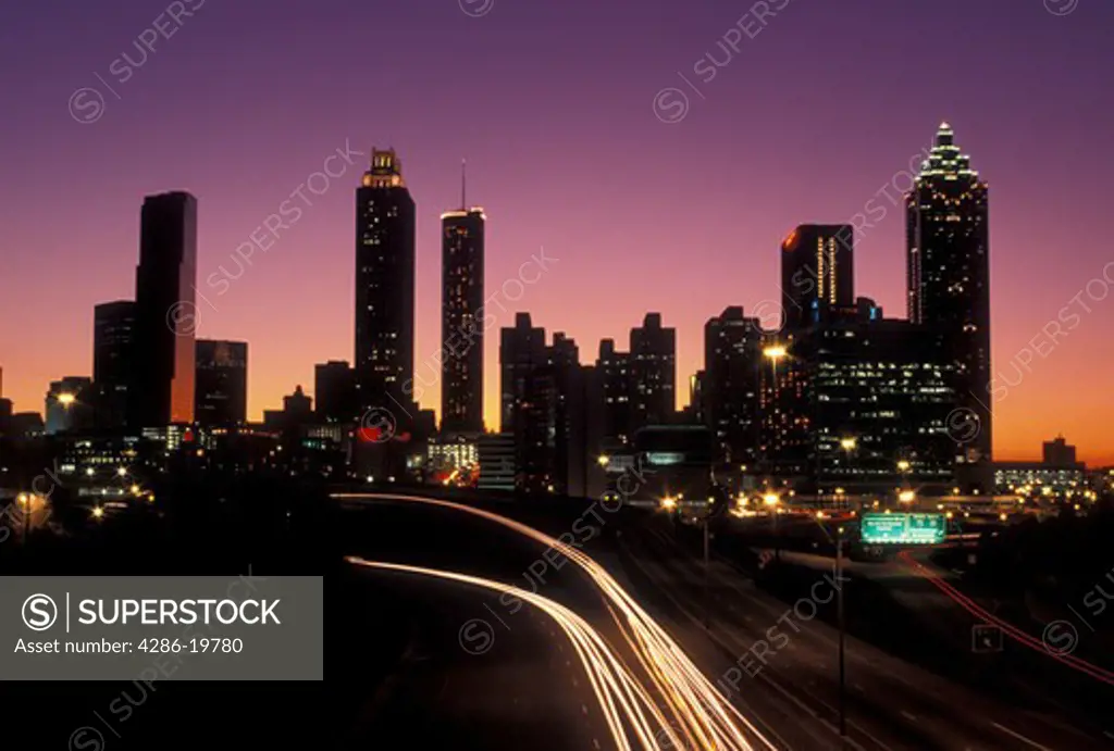 skyline, Atlanta, Georgia, GA, Skyline of downtown Atlanta and traffic from Jackson Street at sunset. 