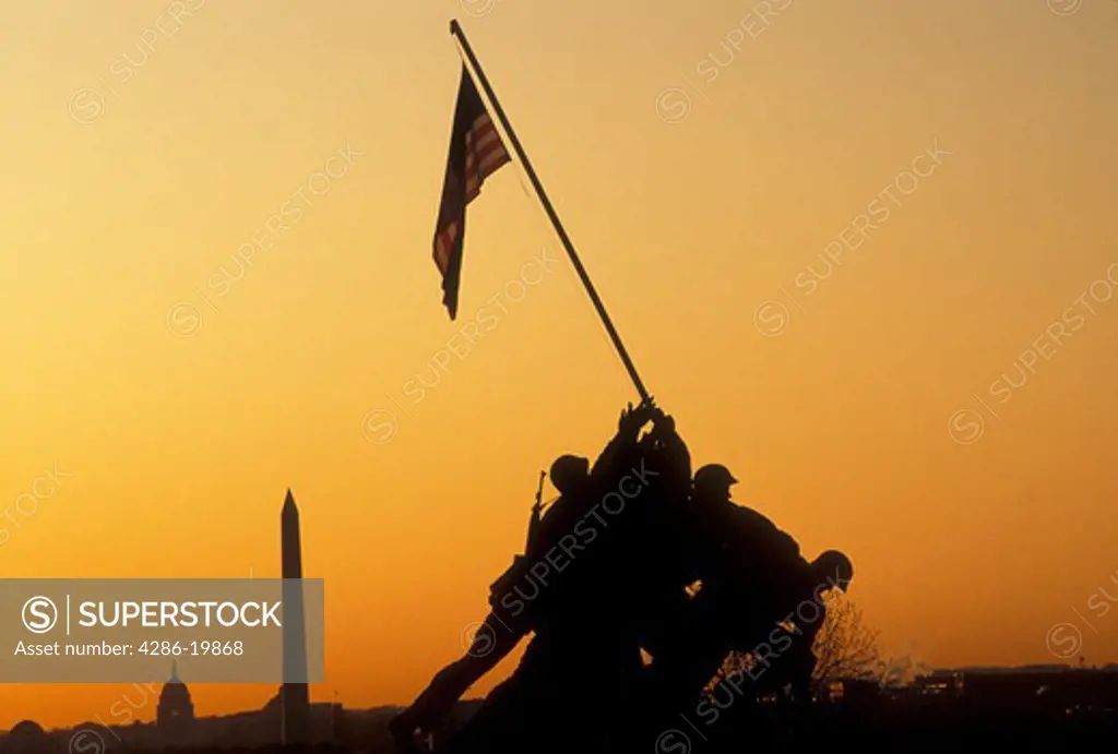 Iwo Jima, Arlington, Virginia, VA, U.S. Flag, Washington, DC, District of Columbia, Marine Corps War Memorial, Iwo Jima, at sunrise in Arlington National Cemetery in Arlington.