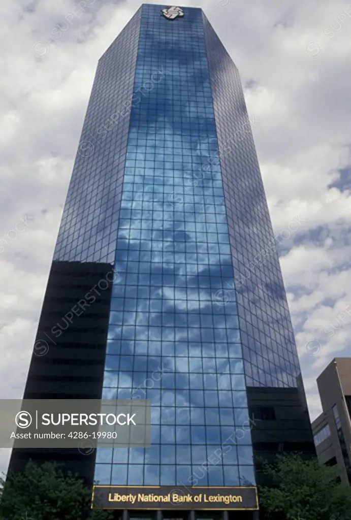 high rise building, Lexington, KY, Kentucky, Reflection of the clouds in the blue glass of the Liberty National Bank of Lexington building in downtown Lexington.