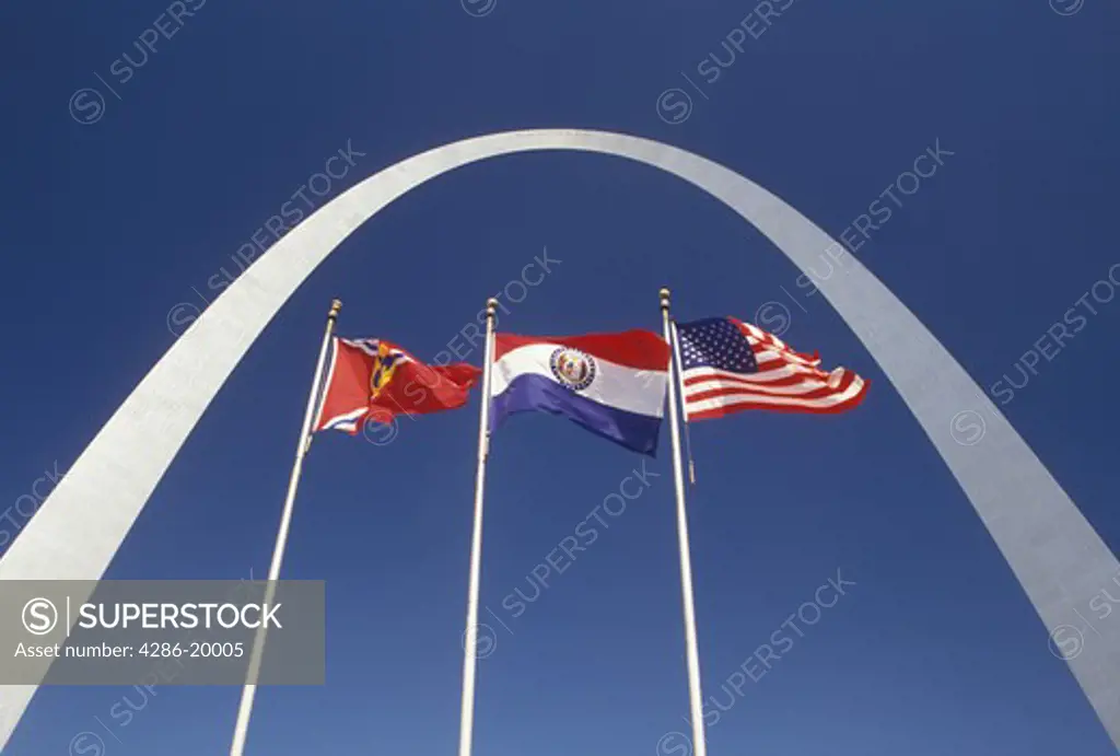 Gateway Arch, St. Louis, MO, Missouri, Flags fly outside the Gateway Arch, Jefferson National Expansion Memorial, in Saint Louis.