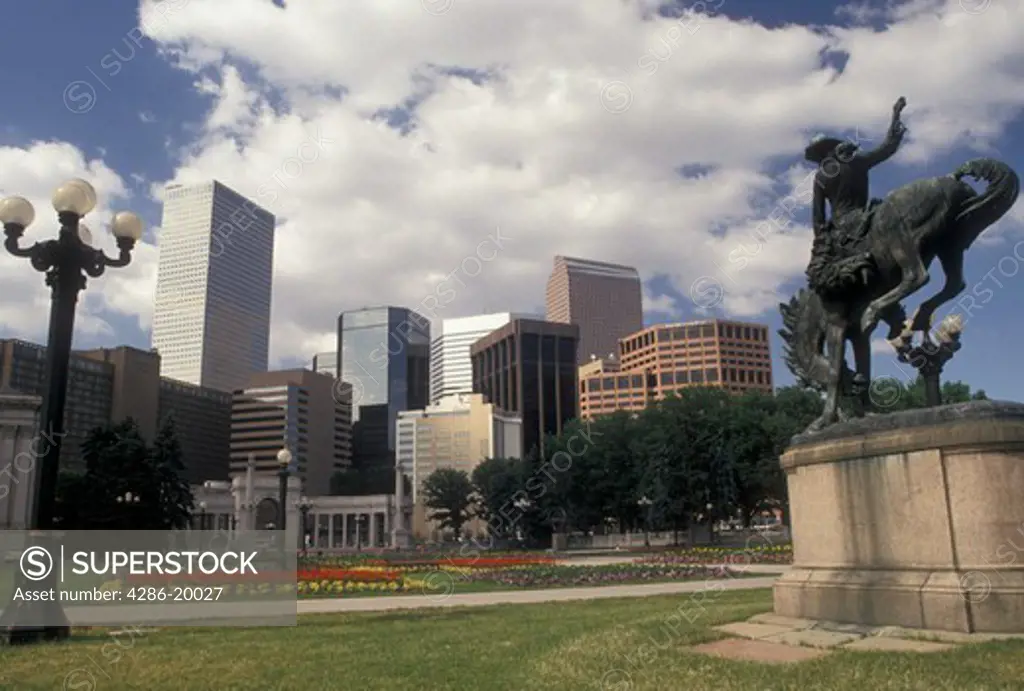 Denver, skyline, CO, Colorado, Broncobuster statue in Civic Center Park and skyline of downtown Denver.