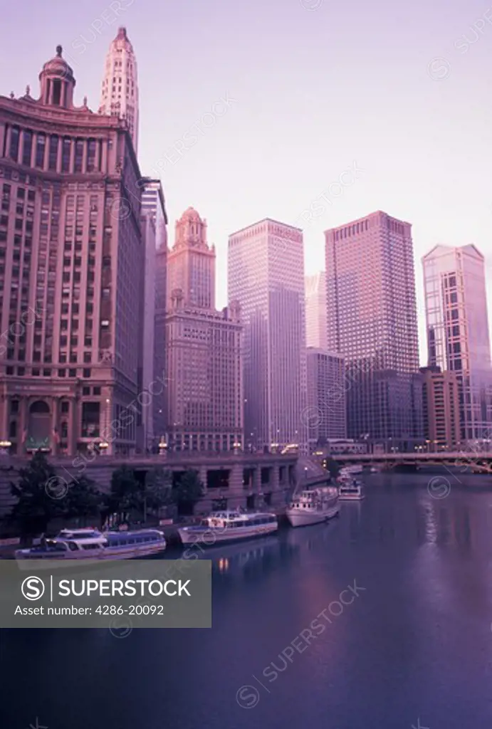 skyline, Chicago, IL, Chicago River, Illinois, Downtown skyline of Chicago along the Chicago River at sunrise.