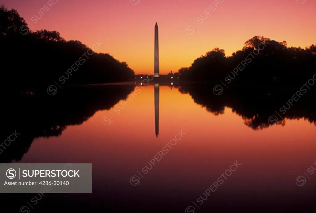 Washington Monument, The National Mall, sunrise, Washington, DC, District of Columbia, The Washington Monument reflects in the reflecting Pool at sunrise at the National Mall in Washington D.C.