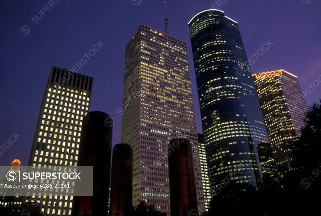 Houston, TX, Texas, Downtown skyline of Houston from Tranquility Park at sunset.