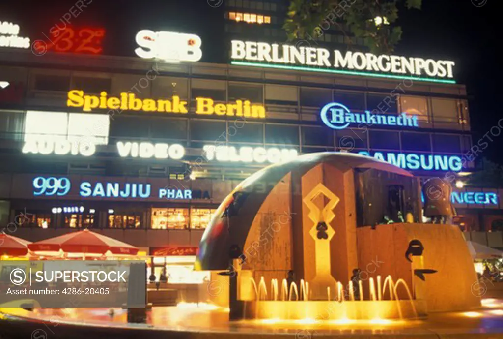 Berlin, Germany, Europe, Europa-Center illuminated with neon lights in the evening in downtown Berlin.